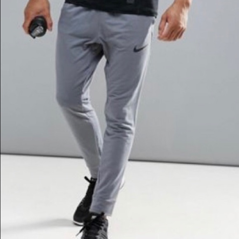 Nike Training Dri-FIT fleece joggers in grey